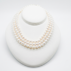 Three-Row Akoya Pearl Necklace by Shepherd Jewelry on white background