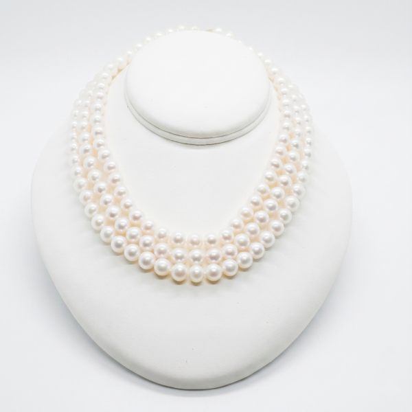 Three-Row Akoya Pearl Necklace by Shepherd Jewelry on white background